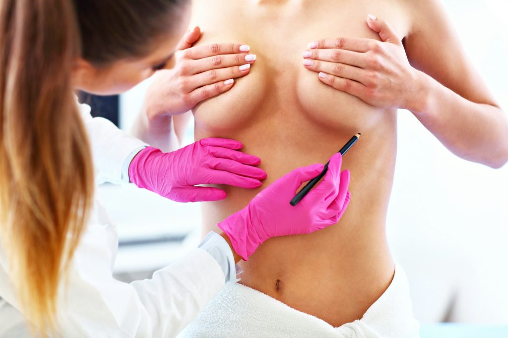 Doctor examining breast