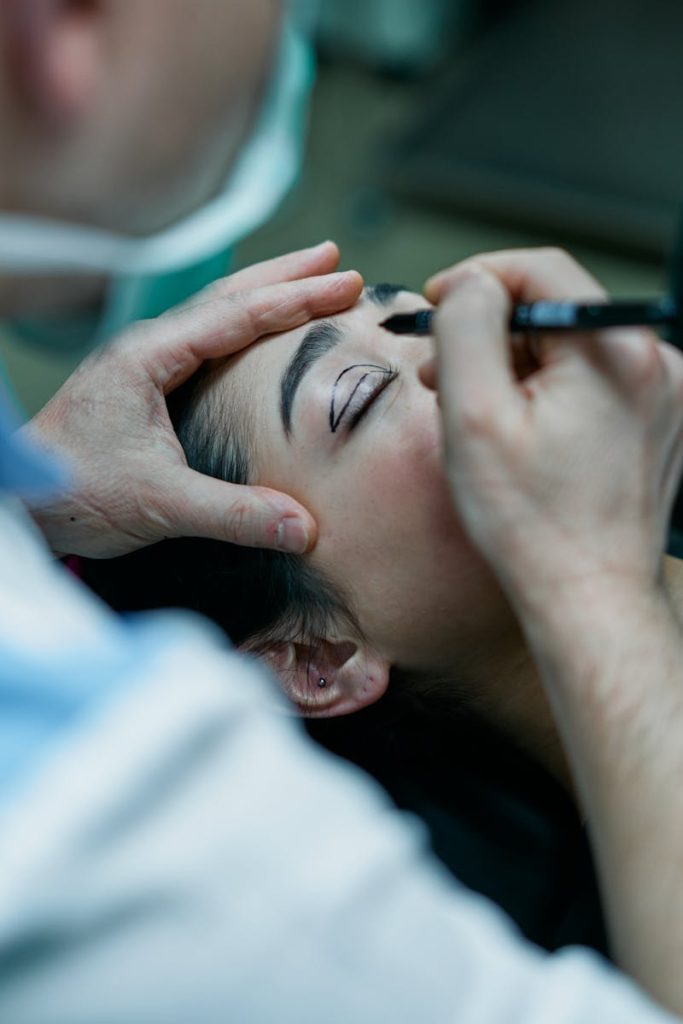 A Surgeon Marking a Patient's Eyelid